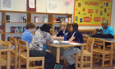 Old Dominion University students, in partnership with Norfolk Recreation, Parks, and Open Space, work as life skills mentors to Norfolk Public School students.