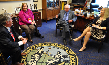 Legislative Forum attendees from North Carolina speak with Rep. Howard Coble.