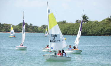 “I Can Do It, You Can Do It!” participants test out their sea legs at the 10-year anniversary celebration for “Anchors Away” at Oleta River State Parks in Miami, Florida.