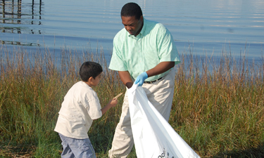 An avid kayaker, Mayor Brown takes the health of his city’s St. Johns River very seriously. Here, he joins other volunteers for the annual St. Johns River Celebration cleanup.