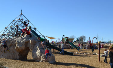 Perhaps the most attractive piece of park equipment for young visitors, the Jupiter XXL climbing structure features intertwined climbing nets, a slide and suspension bridge.