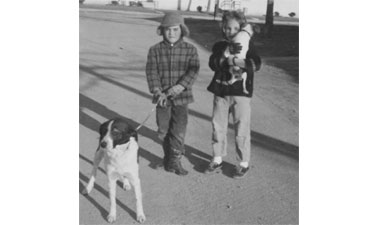 Roseanne Conrad’s love of dogs started at an early age, as shown in this childhood photo.