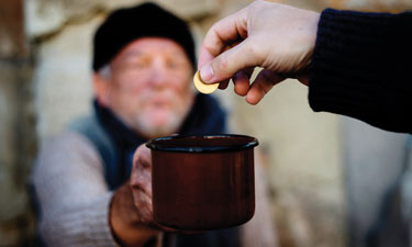 Panhandling bans in the revitalized downtown areas in many cities and states are facing legal challenges on First Amendment grounds.