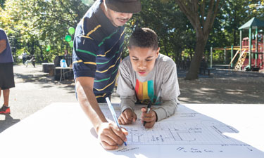 Visitors participate in a community visioning activity led by Friends of Mosholu Parkland with support from PfP. (Melanie Reiders)